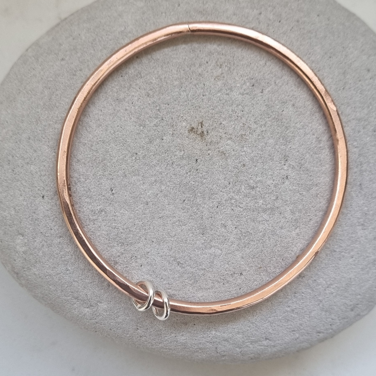 Copper bangle with silver rings