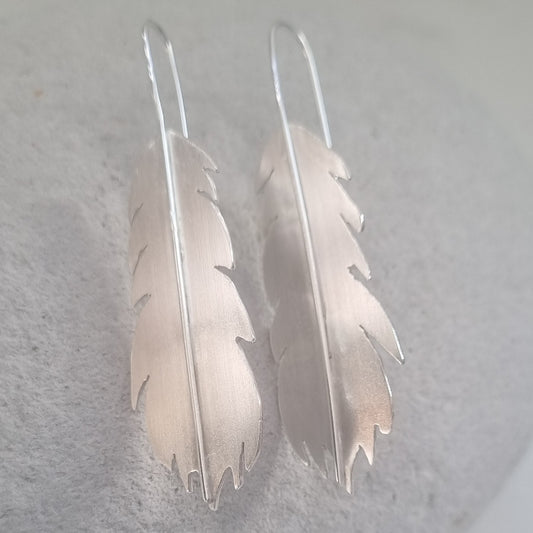Huia feather earrings