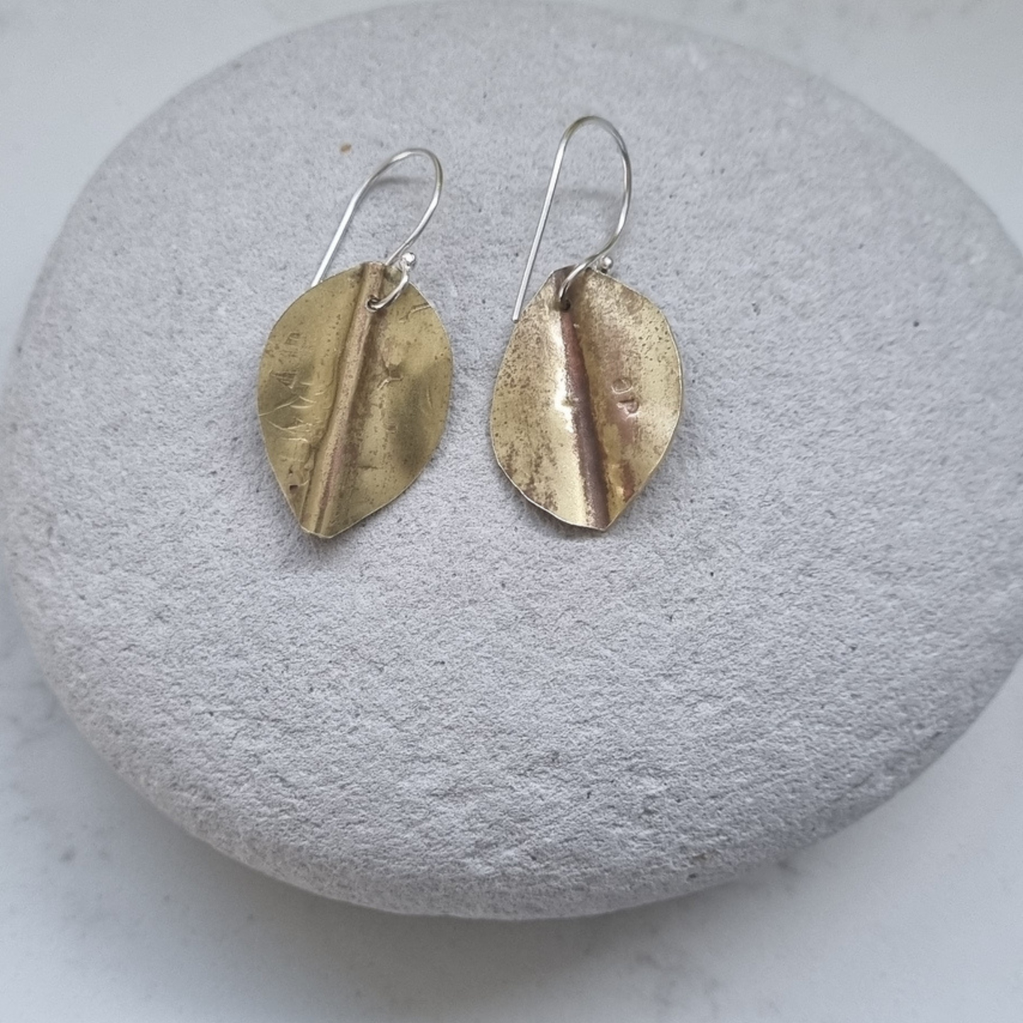 Pōhutukawa leaf earrings in brass